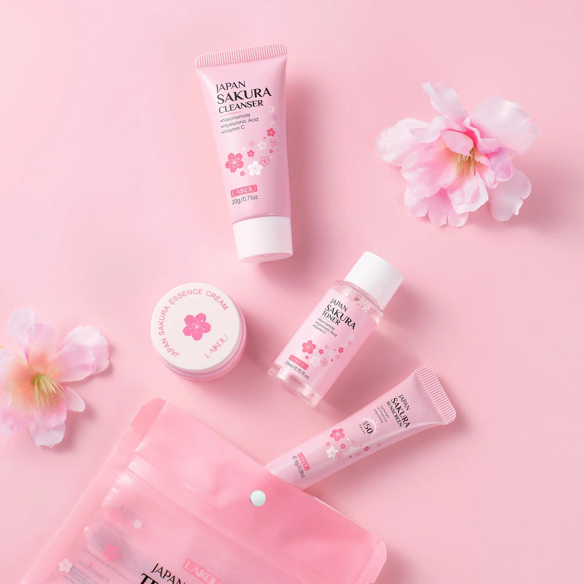 LAIKOU Japan Sakura Travel Kit 4PCS Hydrating Skincare Set Sunscreen Moisturizer Mini Set TSA Approved Travel Essentials by PETAL & GLOW