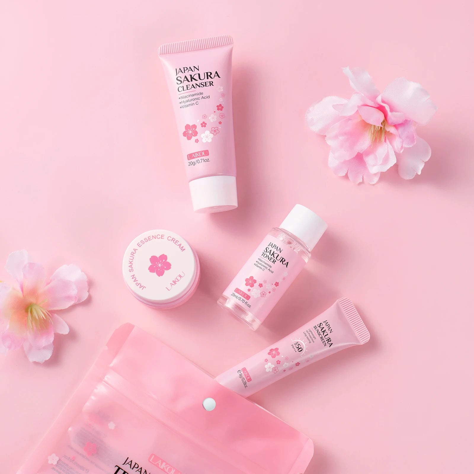 LAIKOU Japan Sakura Travel Kit 4PCS Hydrating Skincare Set Sunscreen Moisturizer Mini Set TSA Approved Travel Essentials by PETAL & GLOW